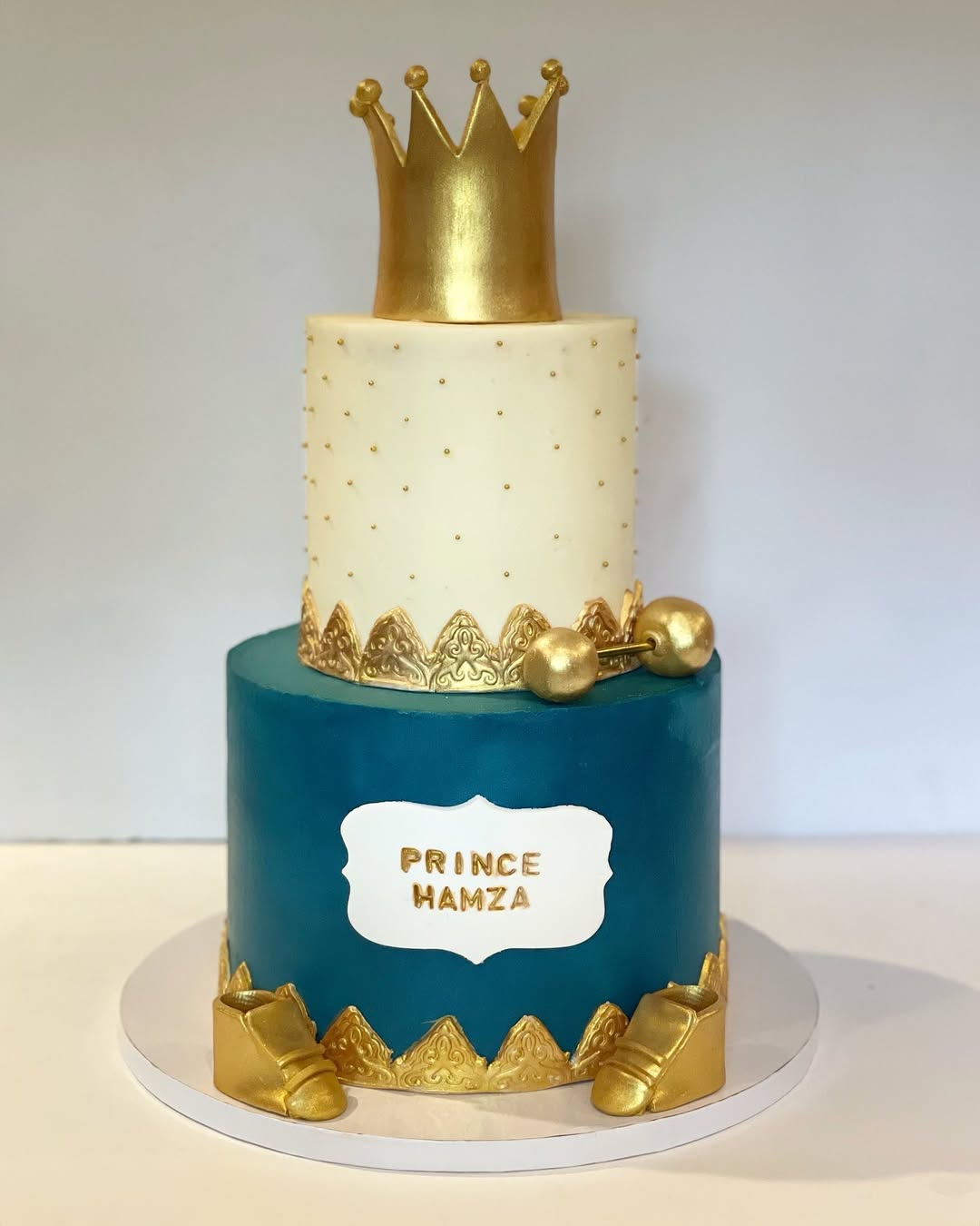 Teal and gold custom tiered cake made by Baked by Warda